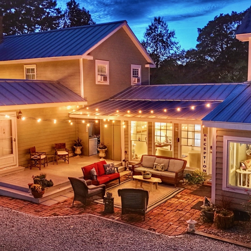 Inn at Oriental Reception Porch lit up with Patio Lights